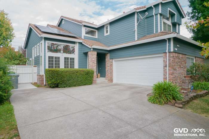 Home exterior featuring James Hardie Evening Blue lap siding and brick accents in Petaluma, CA