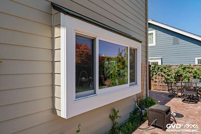 Monterey Taupe James Hardie Lap Siding and Arctic White Mezzo Window in Foster City backyard