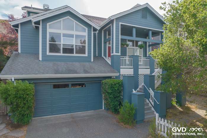 Two-story home exterior in Corte Madera with James Hardie Evening Blue siding and Arctic White trim