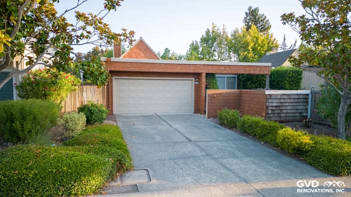 Contemporary home exterior in Sonoma featuring FTX Cedar siding, driveway, and landscaped yard