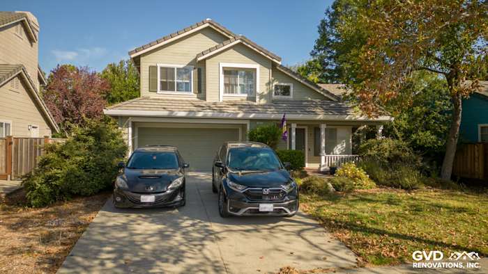 Home exterior featuring James Hardie Evening Blue siding and Milgard Tuscany windows in Petaluma, CA