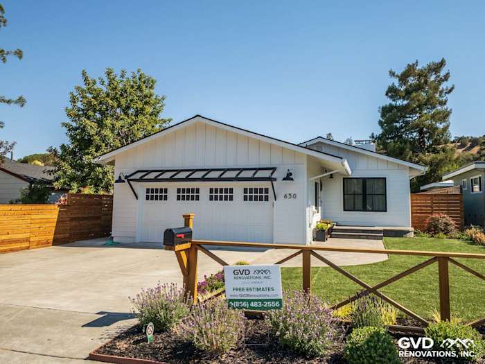 Updated home exterior in Novato, featuring James Hardie Board and Batten Siding with a modern white finish