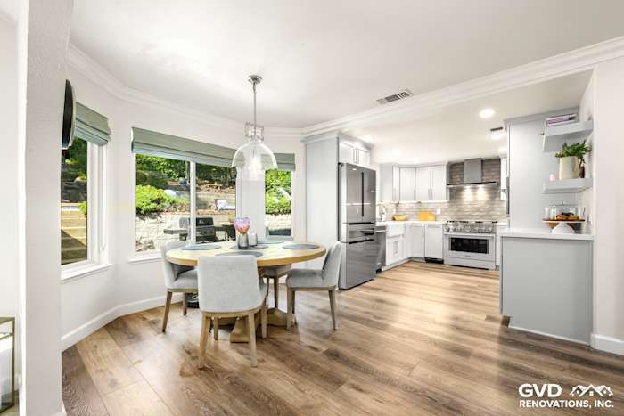 Modern kitchen remodel in Rocklin with quartz countertops, stainless steel appliances, and hardwood flooring