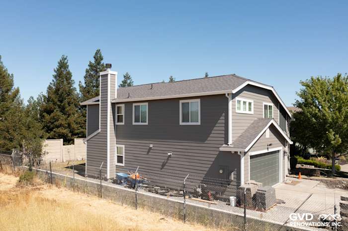 Home exterior featuring James Hardie Aged Pewter siding and Arctic White trim in Rohnert Park
