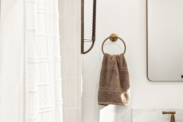 Bright hall bathroom remodel in Fair Oaks featuring a modern shower, quartz countertop, and stylish fixtures