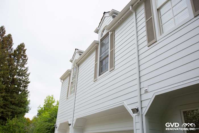 New Arctic White James Hardie siding with trim on a remodeled home exterior in Orinda, CA