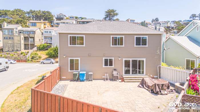 Two-story Pacifica home featuring Khaki Brown James Hardie Lap Siding and Anlin Windows with Cobble Stone trim
