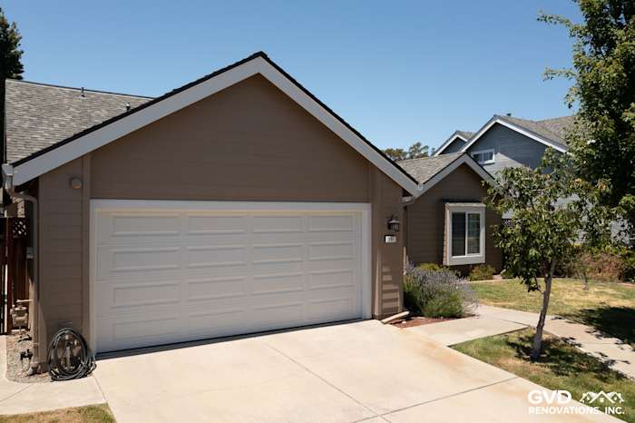 Foster City home exterior featuring James Hardie Artisan Lap Siding in Khaki Brown and Arctic White trim