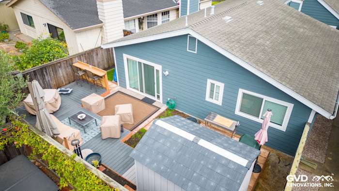Evening Blue James Hardie siding on a home exterior in Alameda, with a spacious deck and Milgard windows