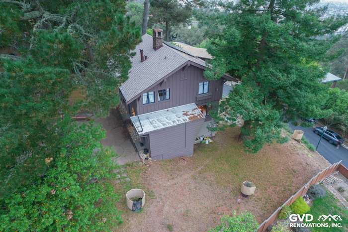 Home exterior featuring James Hardie Lap and Batten Siding in Timber Bark, surrounded by greenery in Berkeley, CA