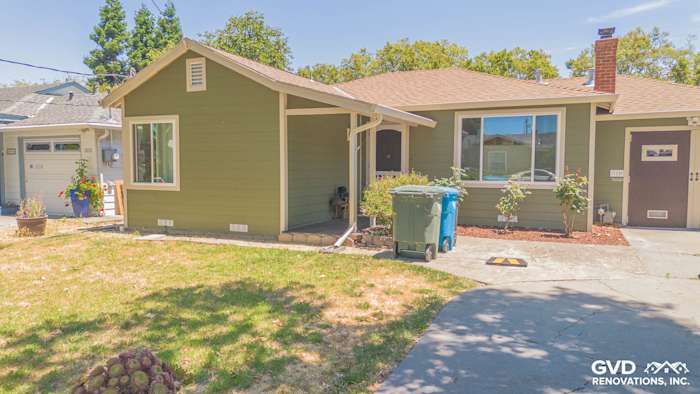 Home exterior featuring Mountain Sage James Hardie lap siding, custom trim, and Anlin Catalina windows in Redwood City