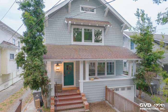 Oakland home exterior showcasing Light Mist Hardie Shingle Siding, Arctic White trim, and inviting entrance