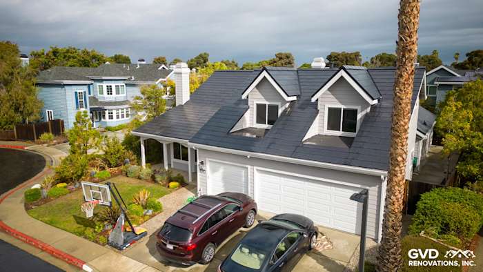 Foster City home with Pearl Gray James Hardie siding and Arctic White trim, featuring new Simonton windows