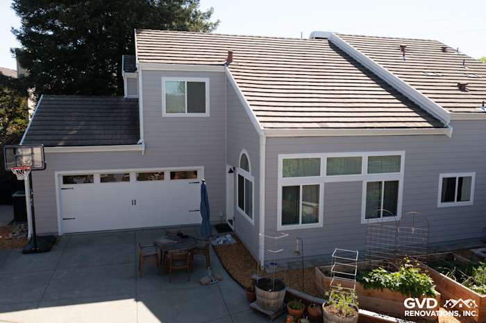 Updated Petaluma home exterior featuring Pearl Gray James Hardie siding and Arctic White trim with new vinyl windows