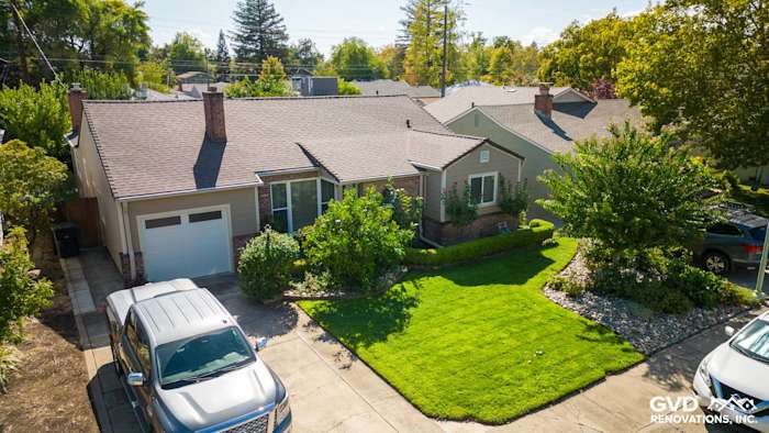 Sleek exterior of a home in Sacramento with Khaki Brown James Hardie siding and well-maintained lawn