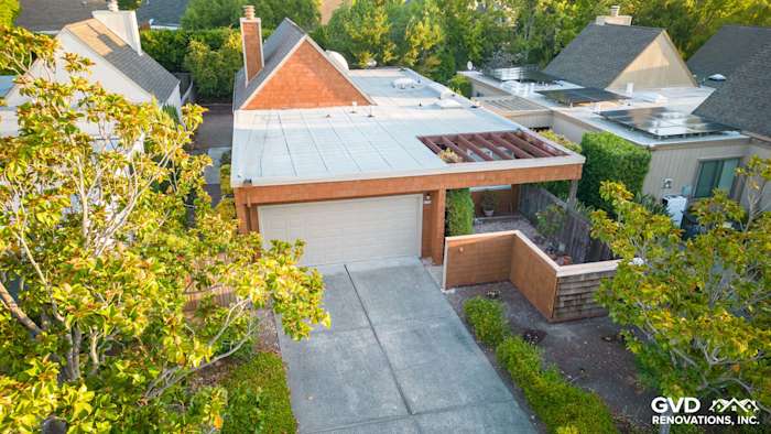 Sonoma home exterior featuring FTX Cedar Sidewall Panel Siding and new Milgard Windows