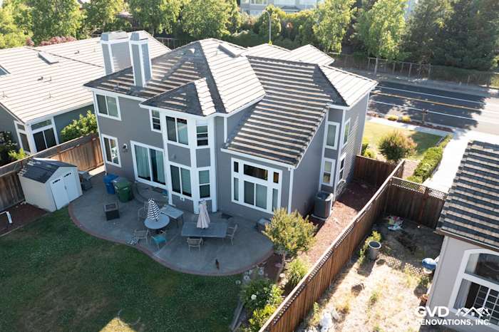 Home exterior in Petaluma featuring James Hardie Aged Pewter siding and new Alside Mezzo vinyl windows