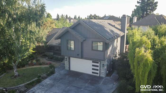Updated Sacramento home featuring Night Gray HardiePlank siding, Iron Gray trim, and modern garage door