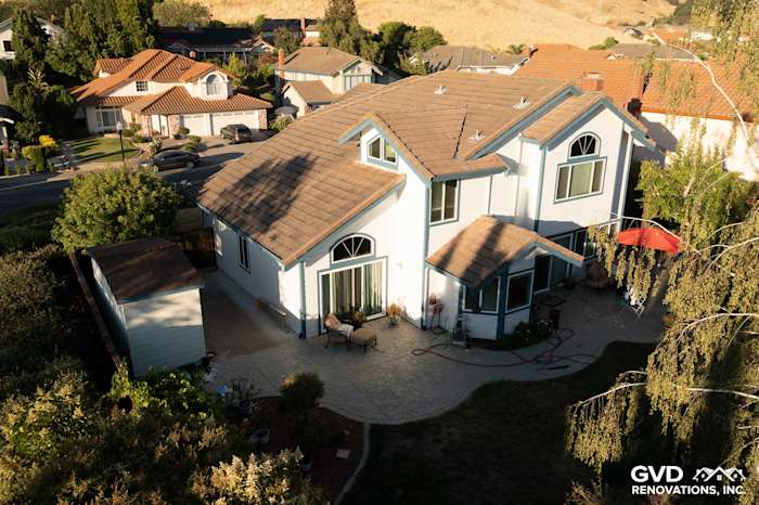 Charming home exterior featuring Arctic White James Hardie Lap Siding and Simonton Windows in Hercules, CA