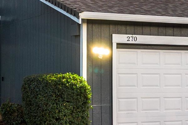 Home exterior in Vallejo featuring James Hardie Evening Blue siding, Arctic White trim, and modern landscaping