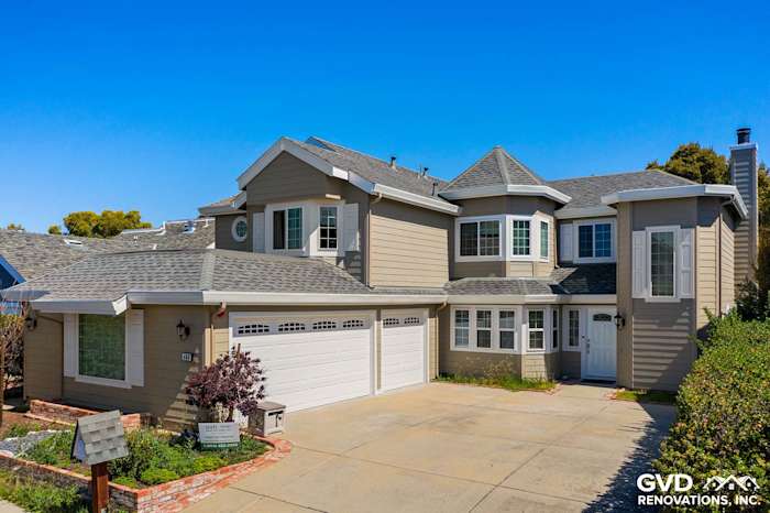 Modern home exterior featuring Monterey Taupe James Hardie lap siding and Arctic White trim in Foster City, CA
