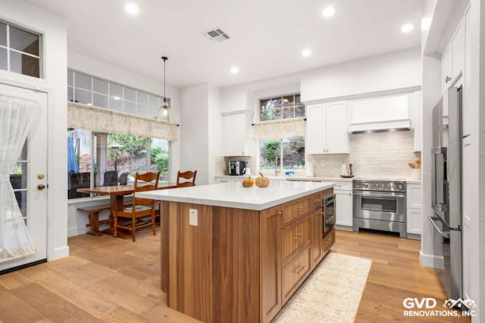 Modern kitchen remodel in Folsom with Waypoint cabinets, Fieldstone island, and Vadara Bronzo countertops