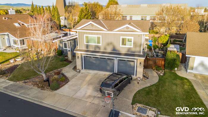 Modern home exterior showcasing Night Gray James Hardie siding with Arctic White trim in Dublin, CA