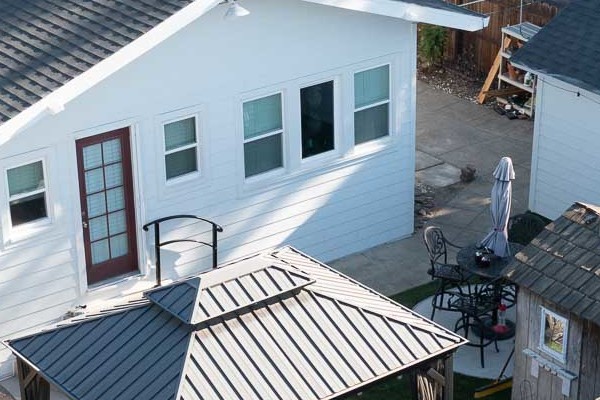 Aerial view of a home with new Arctic White James Hardie siding and trim in Dixon, CA