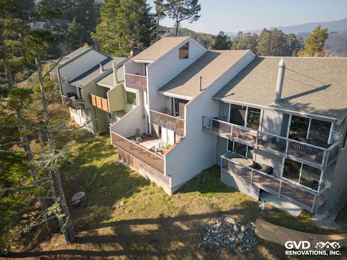 Stylish Pearl Gray James Hardie lap siding on a unique Mill Valley home with multiple balconies and decks