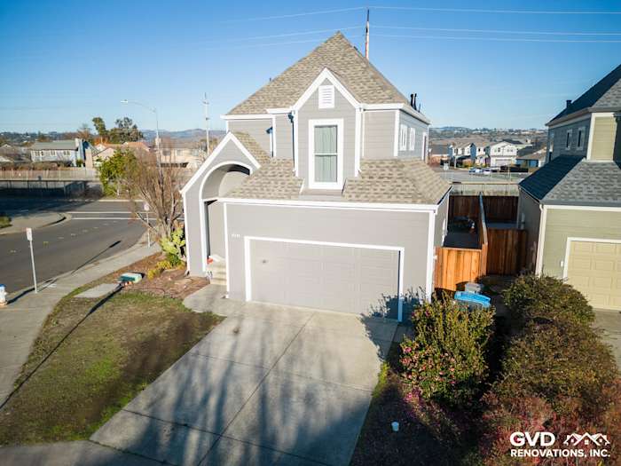 Modern home exterior featuring James Hardie Aged Pewter siding and a sleek garage in Santa Rosa