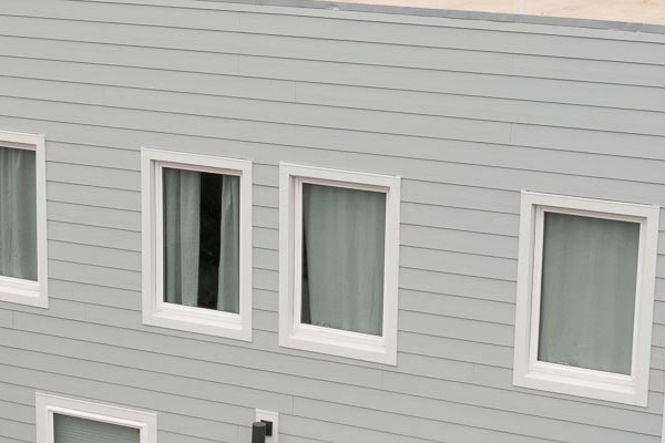 Light Mist James Hardie Lap Siding with Arctic White Trim on San Francisco home exterior
