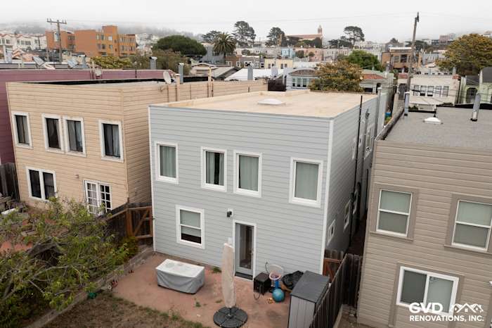 Light Mist James Hardie Lap Siding with Arctic White Trim on San Francisco home exterior