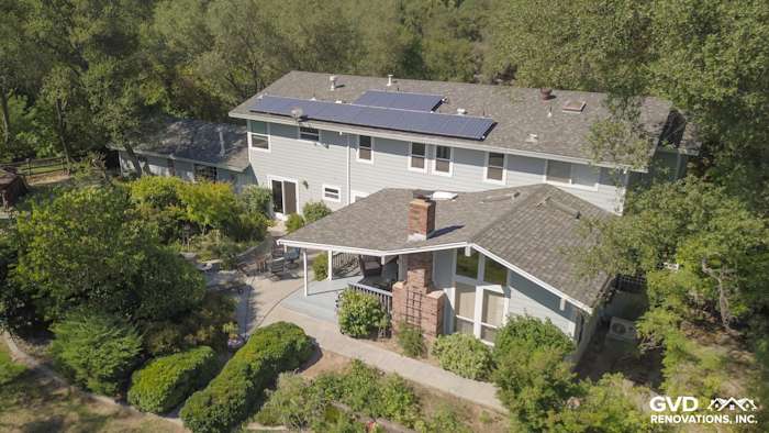 Granite Bay home exterior featuring Light Mist HardiePlank siding, Arctic White trim, and solar panels