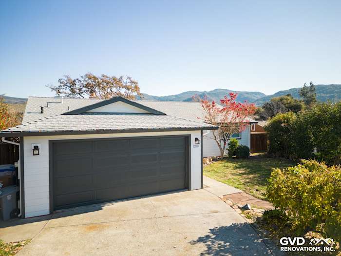 Modern Napa home exterior showcasing James Hardie Arctic White siding and updated garage door