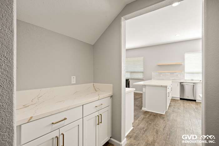 Modern kitchen remodel with MSI countertops, Diamond cabinets, and floating shelves in Roseville, CA