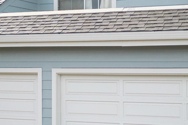 Light blue James Hardie siding with white HardieTrim on a stylish Foster City home exterior