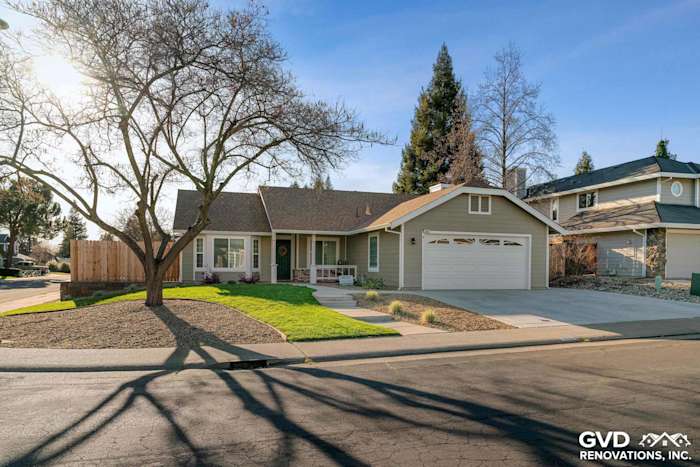 Exterior view of a home showcasing Monterey Taupe HardiePlank siding and Arctic White trim in Folsom, CA