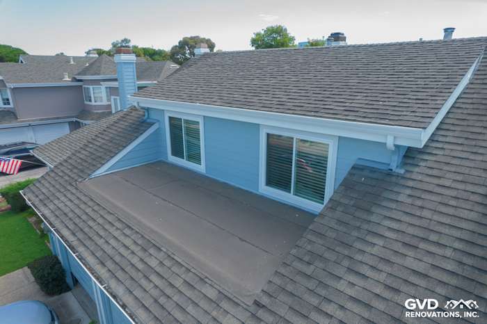 Recently installed James Hardie siding in light blue with Alside windows on a Foster City home