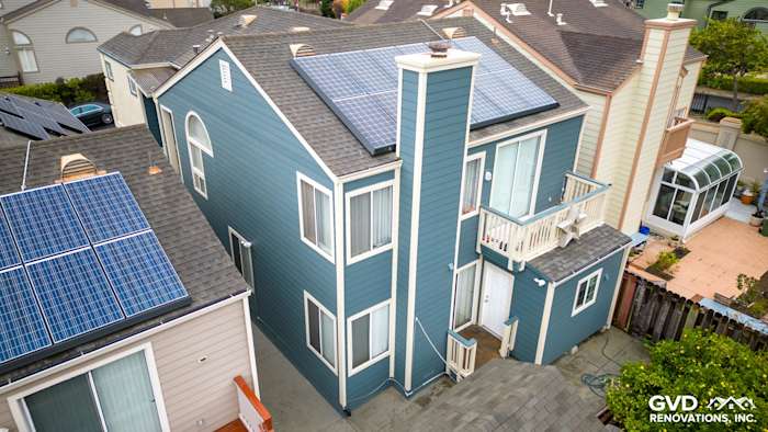 Home exterior showcasing James Hardie Evening Blue lap siding and solar panels in Daly City