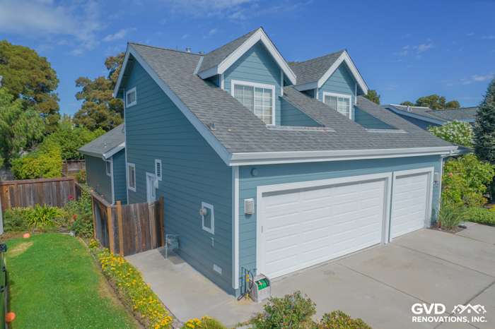 James Hardie siding in Boothbay Blue with Arctic White trim on a remodeled home's exterior in Foster City