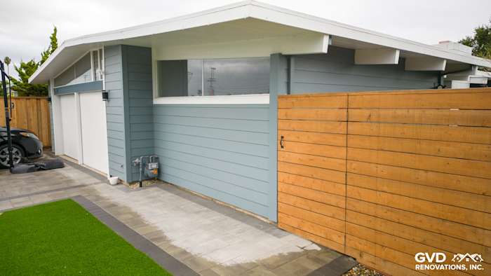 Home exterior featuring Boothbay Blue James Hardie lap siding and Arctic White trim in San Mateo, CA