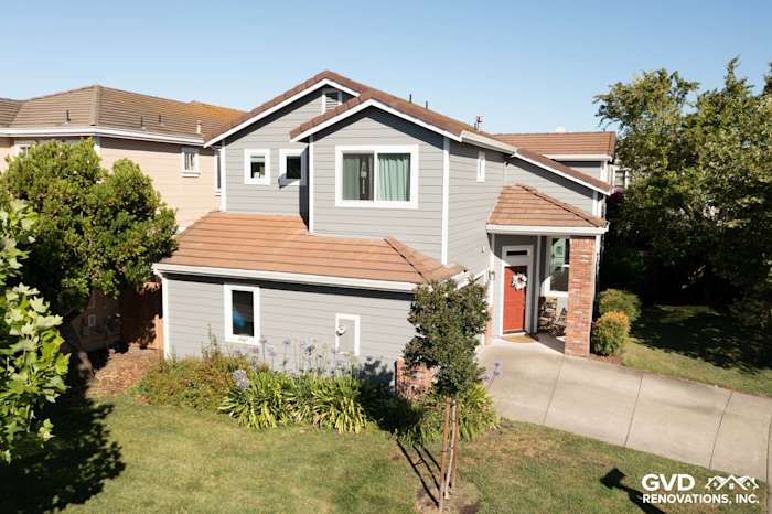 Modern home exterior showcasing Gray Slate James Hardie siding and Milgard windows in Petaluma, CA