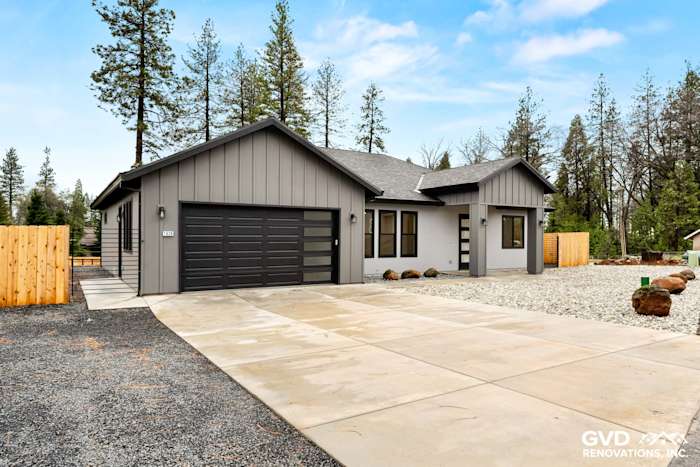 New construction home in Paradise, CA featuring James Hardie Architectural Panels in Sea Grass and black Milgard windows