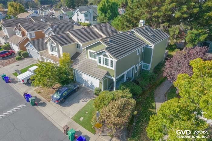 Home exterior showcasing Mountain Sage James Hardie siding and Arctic White trim in Pinole, CA