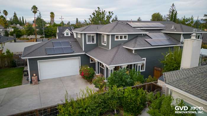 Home exterior featuring James Hardie Pearl Gray siding, Arctic White trim, and solar panels in Campbell, CA