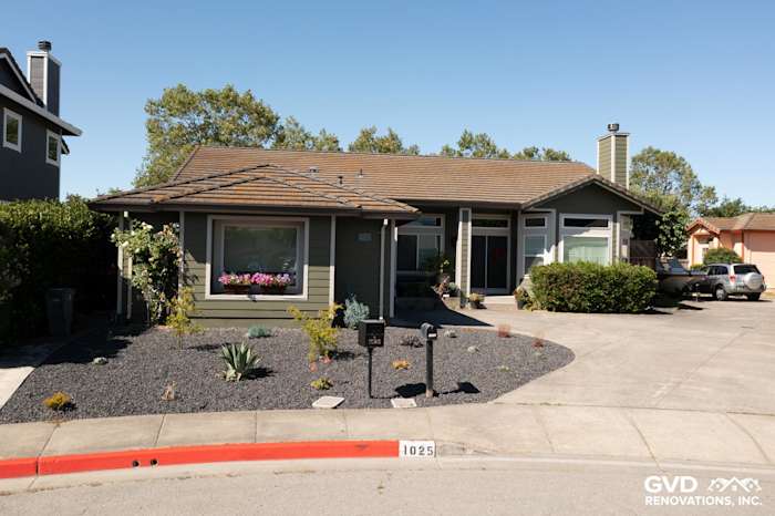 Modern home exterior featuring Mountain Sage James Hardie siding, Cobble Stone trim, and landscaped garden in Petaluma