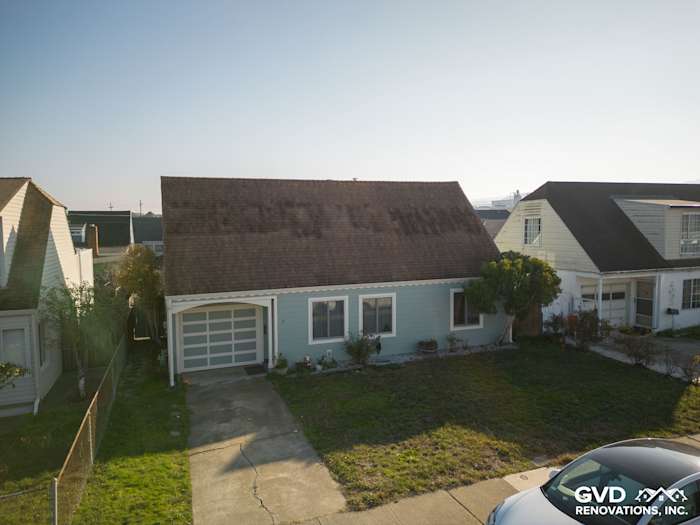Home exterior with James Hardie Artisan Lap Siding in blue, showcasing a complete transformation in South San Francisco