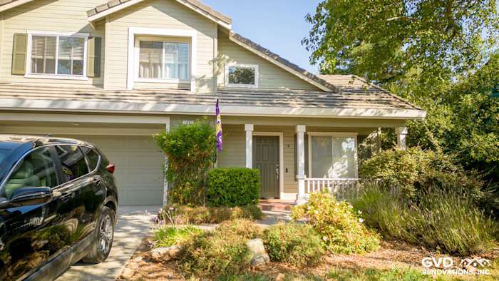 Elegant home exterior in Petaluma featuring Evening Blue HardiePlank siding and Milgard Tuscany windows