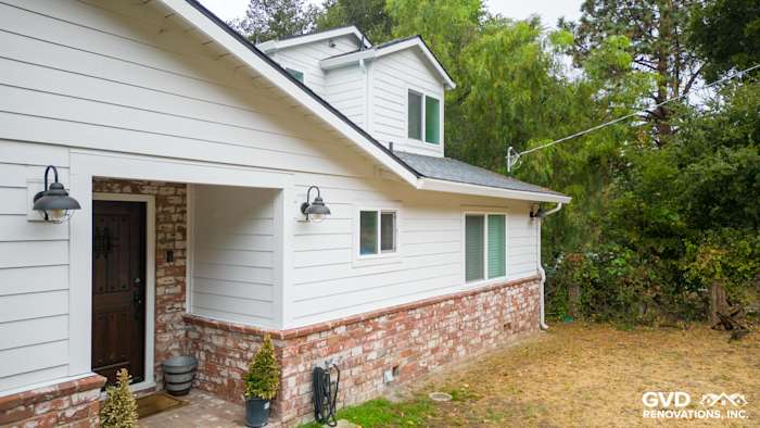 Modern home exterior featuring James Hardie Cedarmill siding and Alside windows in Oakland, CA
