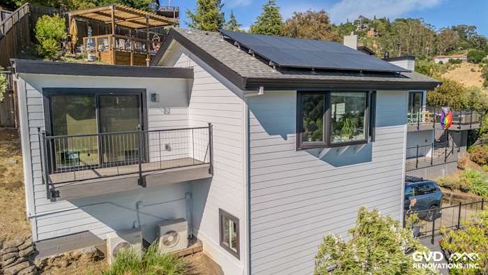 Crisp Arctic White James Hardie siding and Anlin Catalina windows on modern San Rafael home exterior